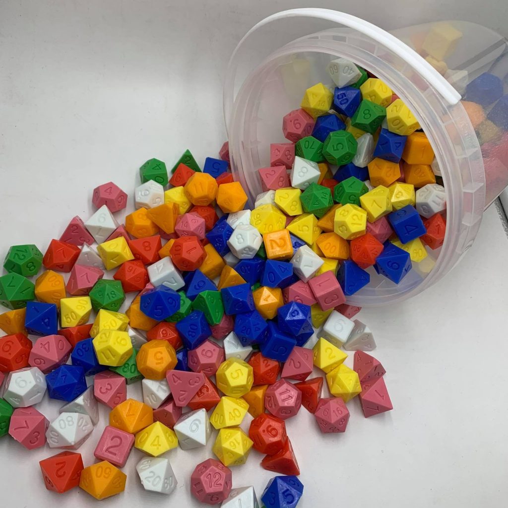 Bucket list games are represented by colorful game dice spilling out of a bucket.